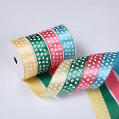 China Luster Custom Printed Single Cut Edge Face Star Satin Ribbon For Decoration for sale