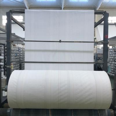 China Natural Material Packaging Factory PP Printed Coated Raffia Woven Tubular Fabric In Roll for sale