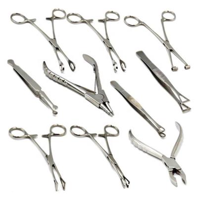 China Professional puncture tool for eyebrow piere DAYSHOW 8pcs/set piercing forceps clamp wholesale sterilized 316 stainless steel body puncture tool kits for sale