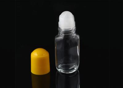 China Transparent Glass Essential Oil Roller Bottles 50ml With Yellow PP Plastic Cap for sale