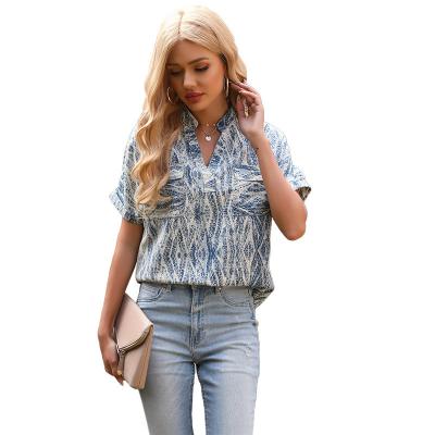 China 2021 breathable European and American new women's summer v-neck sweater printing shirt pocket dyed tying short-sleeved casual shirt for sale