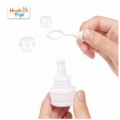 China Fans Favorite Cheer Party Wedding Cake Shaped Soap Bubble Toys With Element Magic Wands For Celebrations for sale