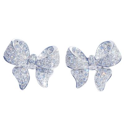 Cina Il platino Diamond Bow Stud Earrings 0.10ct CONTRO chiarezza 4.5gram ha personalizzato in vendita