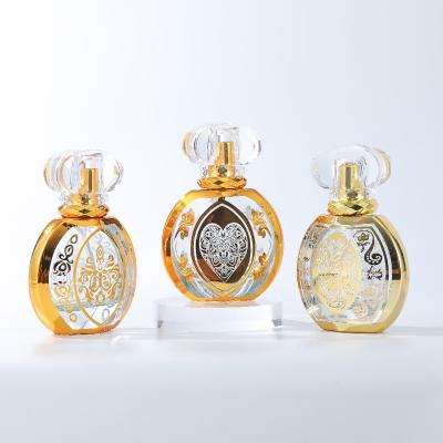 China New Style Cosmetic Perfume Glass Bottle 50ml Perfume Bottle Custom Golden Perfume Spray Bottle for sale