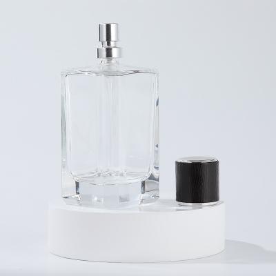 China Modern wholesale french eco friendly clear empty spray botol parfum100ml mini square shaped glass perfume bottle manufacturer for sale