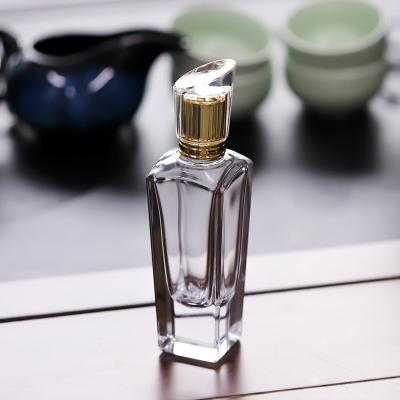 China Factory Crystal White Glass Thick Bottom Cosmetic Bottle Customized Matte Polished Silk Screen Flat Round Perfume Bottle for sale