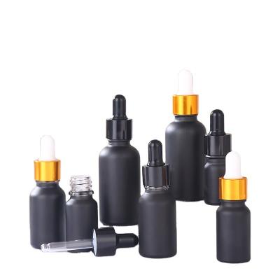 China Do you supply design manufacturer 5ml 10ml 15ml Matte Black Essential Oil Bottle Face Serum Glass Dropper Glass Cosmetic Packaging Bottle for sale