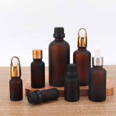 China Wholesale Lead Free Glass Amber Frost Matte Shiny Cylinder Eco-friendly Recyclable Essential Oil Hot Bottle for sale