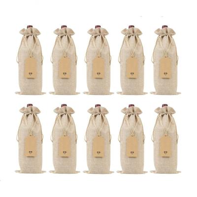 China Office Decoration 10pack Burlap Wine Gift Bags Drawstrings Reusable Wine Bottle Covers with Strings and Tags for sale