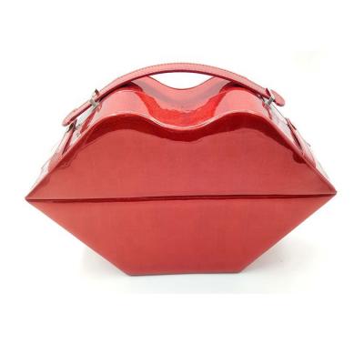 China Fashion Special Custom Red Lip Shape Make Up Box Handle Shiny Vegan Makeup Beauty Leather Cosmetic Carry Boxes for sale