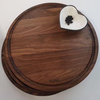 China 2021new Round Black Walnut Stocked Cutting Board With One Sink for sale