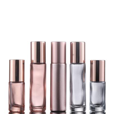 China OEM ODM Rose Gold Electroplating Skincare Glass Bottle Eco-Friendly Refillable Refillable Packaging With Glass Trackball for sale