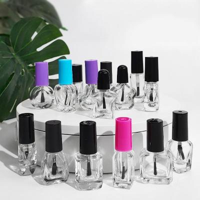 China Eco-friendly Surface Handling Customized Logo Different Sizes Clear Nail Oil Bottles Glass Polish Cosmetic Bottles for sale