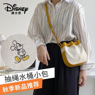 China 2022 Disney tidal fashion tidal net non-woven fabric all-match drawstring bucket bag canvas one-shoulder messenger bag red red new for sale