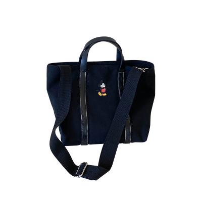 China arming & Disney Mickey Canvas Bag Ladies Handheld Bag All-match Insist One-Shoulder Tote Literary Disarming Simple Fashion for sale