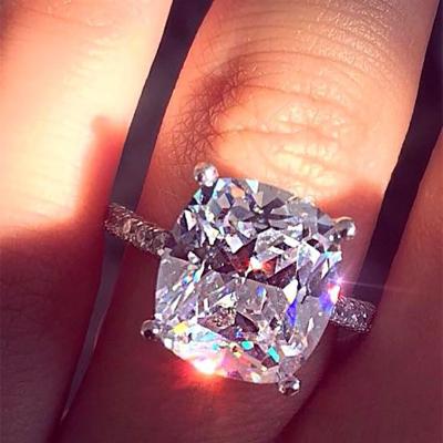 China Hiphop 2020 Big Cut Fashionable Zircon Simulated Diamond Halo Wedding Engagement Ring for sale