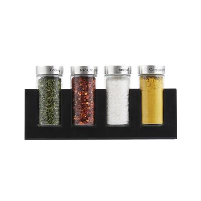 China Small Cute Multi-colored Viable Spice Rack Spice Storage Rack With 4 Glass Jars for sale