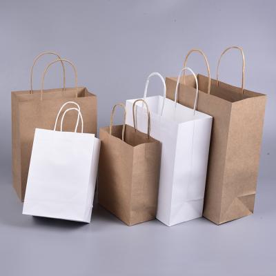 China Wholesale Recyclable Recycle White Colored Brown Paper Bag Kraft Gift Shopping Bag With Handle for sale