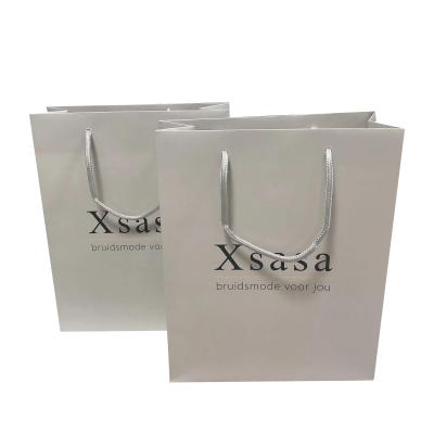 China Recyclable Luxury Custom Printed White Logo Gold Stamping Gift Paper Shopping Bags for sale