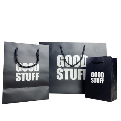 China Wholesale Recyclable Custom Logo Printed Eco-friendly Degradable Black Luxury Shopping Paper Bag With Handle for sale