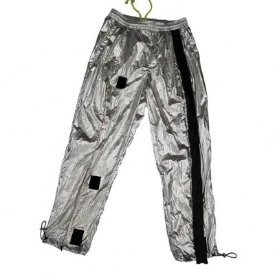 China Anti Pilling Mens Track Pants Drawstring Waist Pants Taped Retail Mens Shiny Trousers In Slivery for sale