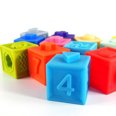 China DIY Building Brick Colorful Compression Educational Sensory 12 Pieces Stacking Soft Silicone Building Block Stacking Toys For Baby Learning Cube for sale