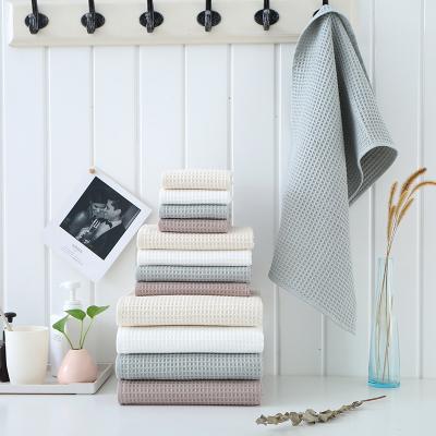 China Hot sale color 100% cotton towel walf checks bath towel home use wash solid pure face towel safe for kids for sale