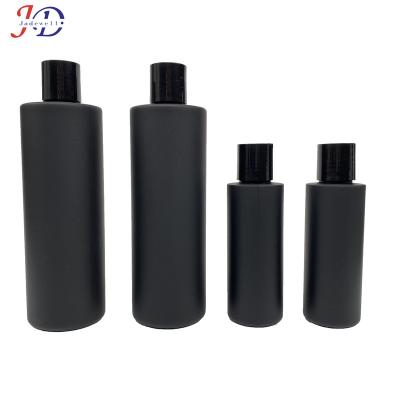 China Wholesale 120Ml 250Ml Single Black Cylinder Flat Shoulder Frosted HDPE Shampoo Lotion Bottles With Screw,Press,Spray Cap for sale