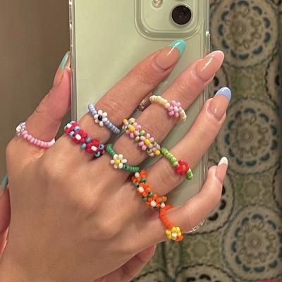 China Cute Colorful Bohemia Woman Accessories Pearl Rice Flower Style Holiday Kids Ring Fashion Geometric Little Girl Ring Gift for sale