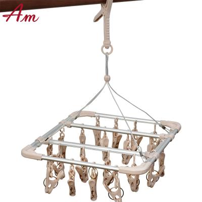 China Viable multifunctional rotating clothes stretch, drying rack, socks drying rack for sale