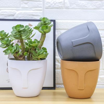 China Wholesale Modern Garden Supplies Cement Planter Succulent Pot Home Decorative Face Flower Pot for sale