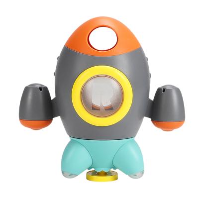 China Bath Toy Cute Rocket Shaped Shower Toys Baby Bath Toys Rotating Water Spray Baby Shower Beach Toys for sale