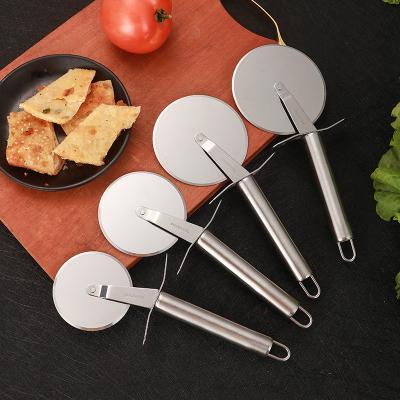 China Amazon Success Kitchen Accessories Pizza Tools 430 Stainless Steel Pizza Cutter Rocker Rocker Kitchen Instrument Sustainable Pizza Cutter for sale