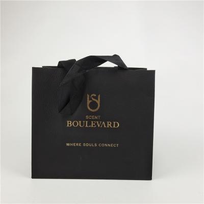 China Promotional Suitable Price Square Bottom Customized Paper Bags With Drawstring For Gift / Garment / Shopping for sale