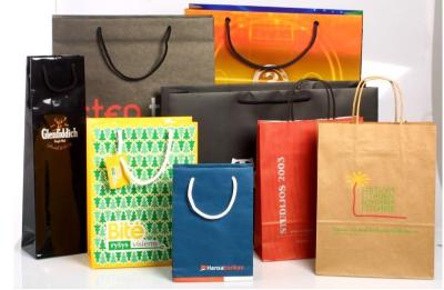 China Recyclable Customized Paper Bags Full Color Printing Kraft With Handles for sale