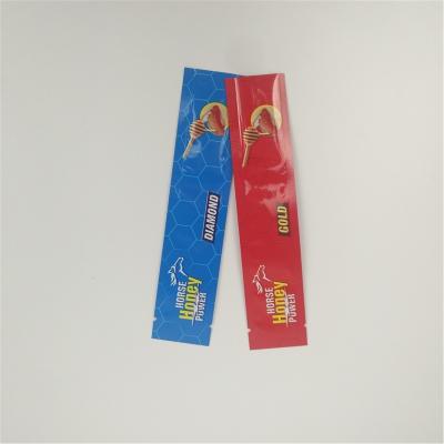 China Aluminium Foil Plastic Honey Stick Pack Sachet Packaging Sugar Candy Food Bags for sale