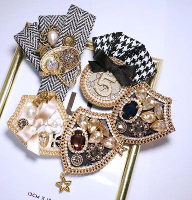 China 2021 European and American style retro thousand autumn/winter new Baroque Mesh Jazz Brooch pearl handmade birds for sale