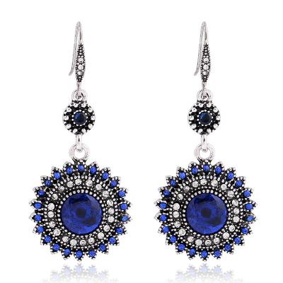 China Small New European and American Bohemian Ethnic Retro Fresh Sun Flower Earrings for sale