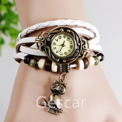 China Cheap Promotional Retro Owl Pendant Product Day/Date Wristband Leather Strap Watch For Women Watch for sale