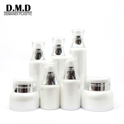 China Personal Care Skin Care Bottles 30grams 50 Grams 120ml 100ml 150ml Pearl White Large Airless Jar And Pump Bottle With Silver Collar for sale