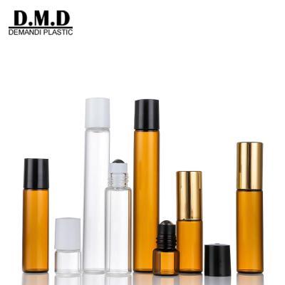 China Custom Clear Glass Essential Oil Ball Bottle 5ml 10ml Perfume Rollball Slim Amber Bottle Of Personal Care 1ml 2ml 3ml With Lids for sale