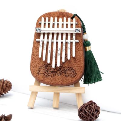 China 8 Key Accompaniment Exquisite Mahogany Palm-Sized Mini Instrument with Kalimba Accessories for sale