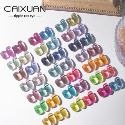 China 2020 Caixuan 2020 Best Selling Rainbow Effect Diamond Cats Eye Gel Silver Super Shiny Cats Eye Gel Cats Eye Magnetic Gel for sale