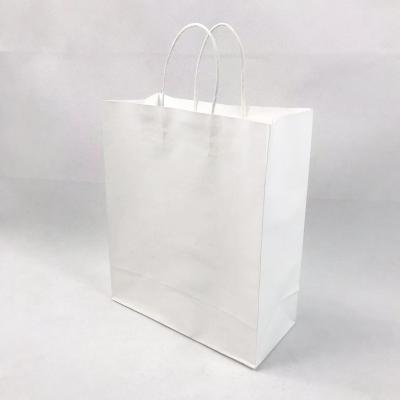 China Wholesale Yiwu Recyclable Packaging Bags Recycle White Kraft Paper Logo Print Boutique Clothes Bag Customized for sale