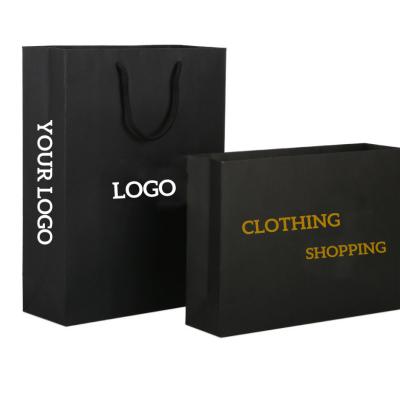 China Custom Shopping Boutique Clothing 250g Recyclable Black Cardboard Paper Bag Paper LOGO Print Black Gift Bag for sale