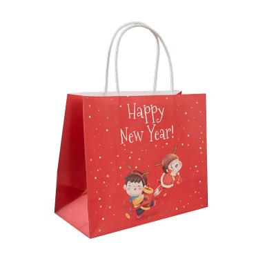 China Recyclable Wholesale Eco - Friendly Craft Paper Bag Printed Hot Foil Kraft Bag With Handle for sale