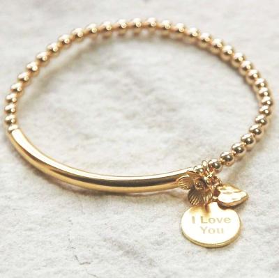 China CLASSIC Curved Charm Engraved Text Word Logo Coin Disc Small Stainless Steel Bar Tube Heart Gold Plated Bead Bracelet for sale