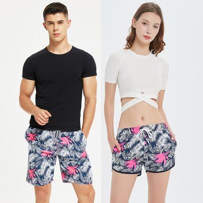 China Breathable Couples Beach Wear Swim Trunks Sublimation Hawaii Print Matching Beach Shorts 4 Way Stretch Beach Swim Shorts Wholesale Women for sale