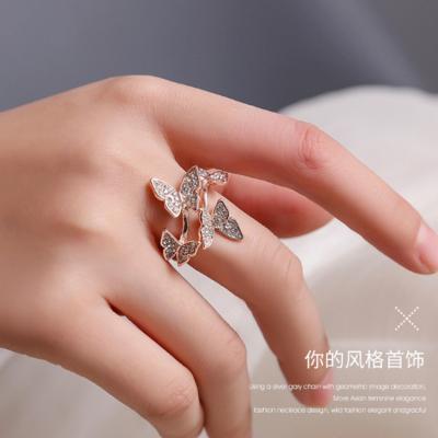 China New Wild Light Luxury Nickel Free Diamond Four Butterfly Ring Women's Full Index Open Rings Jewelry for sale