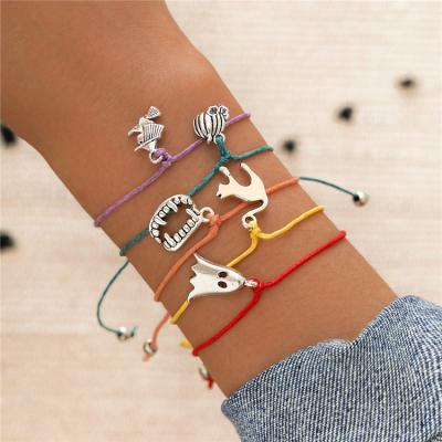 China TRENDY Halloween 5-Piece Set Hand & Woven Cat Pumpkin Ghost Witch Vampire Teeth Fangs Bracelets for sale